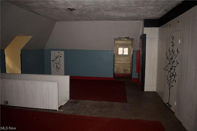 bonus room featuring lofted ceiling