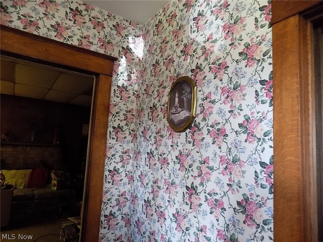 bathroom featuring a paneled ceiling