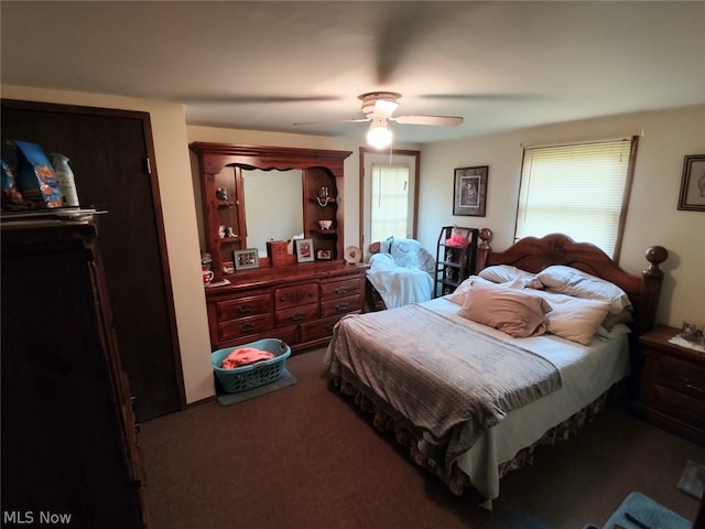 bedroom featuring ceiling fan and carpet floors