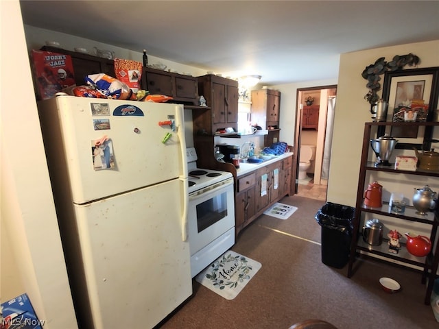 kitchen with white appliances and sink