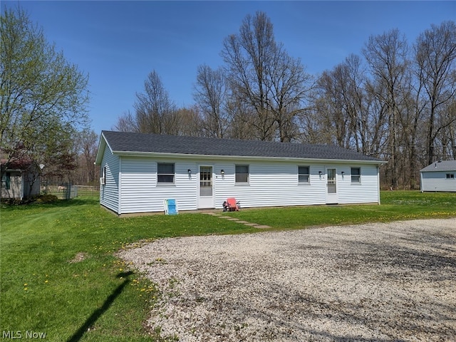 view of front of property with a front lawn