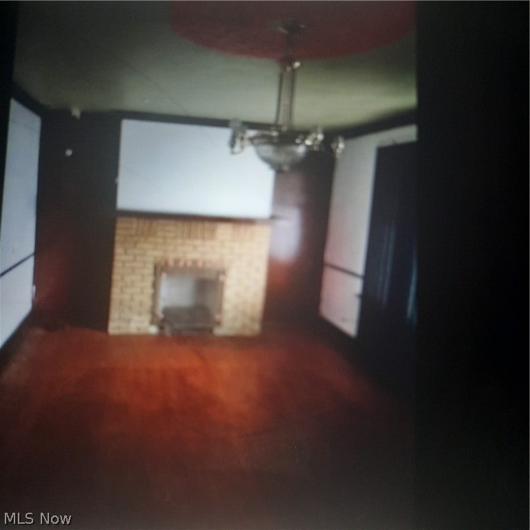 unfurnished living room with a fireplace