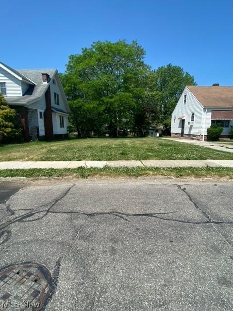 view of home's exterior with a lawn