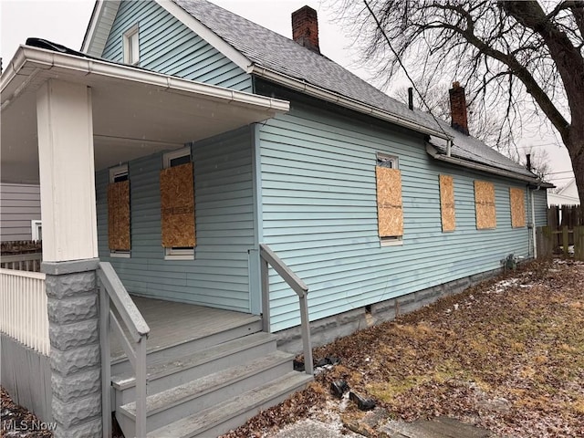 view of home's exterior with a porch