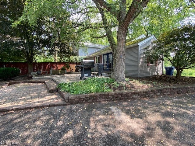 back of house featuring a patio