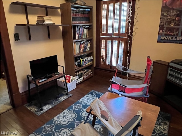 office area featuring dark wood-type flooring