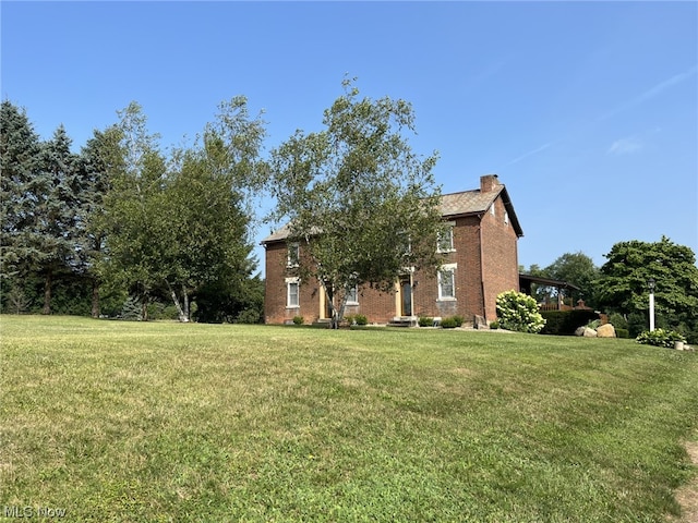 exterior space with a front lawn