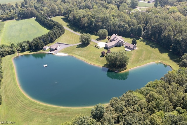 birds eye view of property with a rural view and a water view