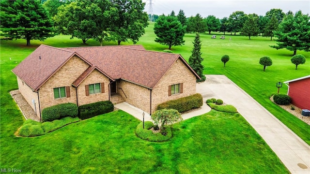 view of front of home with a front lawn