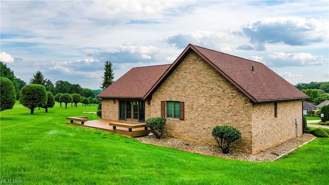 view of home's exterior featuring a lawn