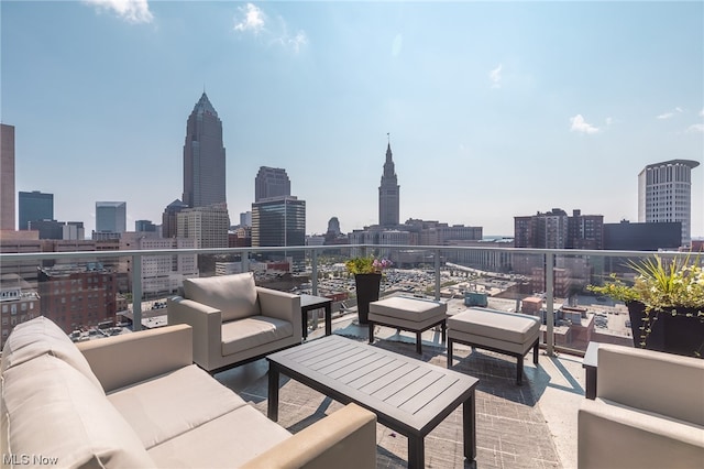 view of patio / terrace with a balcony and an outdoor hangout area