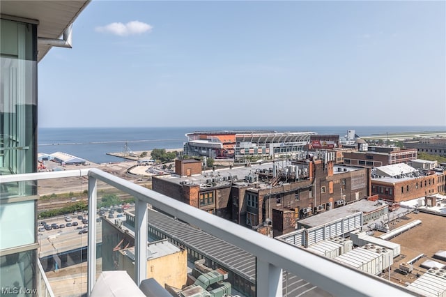 balcony featuring a water view