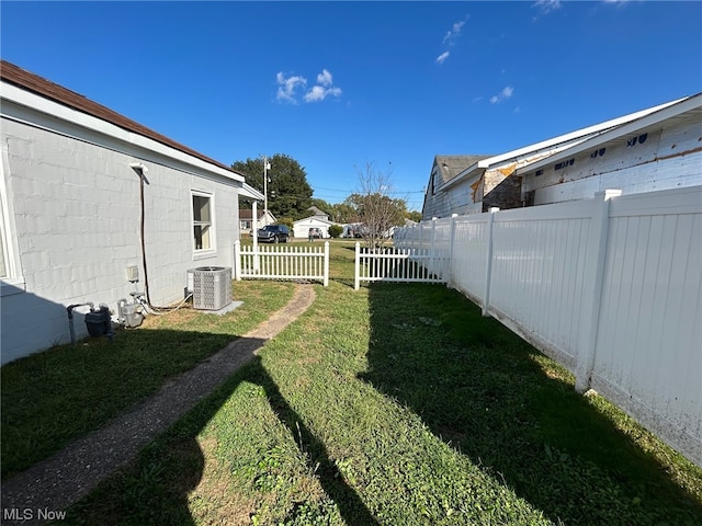 view of yard featuring central AC