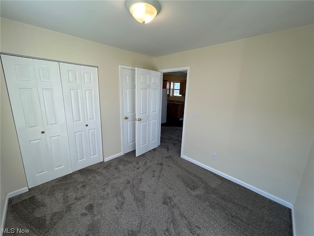 unfurnished bedroom featuring carpet floors