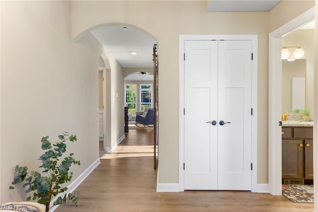 hall featuring light hardwood / wood-style flooring