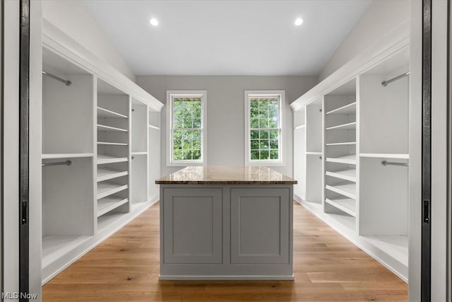2585 Glendale Rd, Marietta, OH 45750 - spacious closet with light wood-style floors and vaulted ceiling