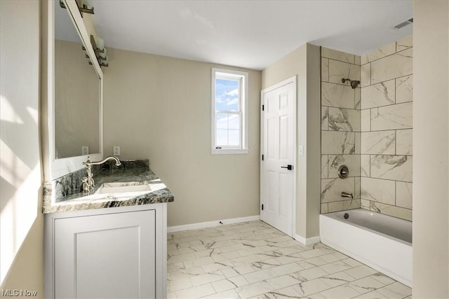 2585 Glendale Rd, Marietta, OH 45750 - full bath with shower / washtub combination, marble finish floor, vanity, and baseboards