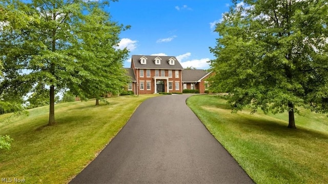 2585 Glendale Rd, Marietta, OH 45750 - view of front of house with a front yard and driveway