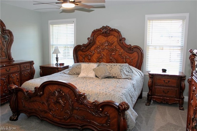 carpeted bedroom featuring ceiling fan