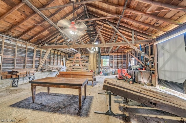 rec room with lofted ceiling with beams