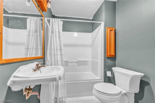 bathroom with toilet and shower / bathtub combination with curtain