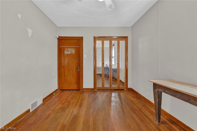 spare room featuring light hardwood / wood-style floors