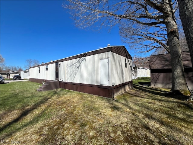 view of property exterior featuring a yard