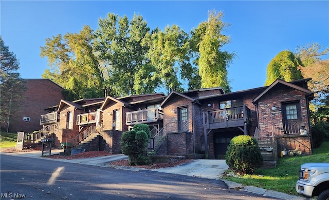 view of front of home with a balcony