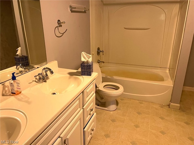 full bathroom with tile patterned floors, washtub / shower combination, dual bowl vanity, and toilet