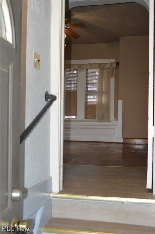 interior space featuring hardwood / wood-style flooring and ceiling fan