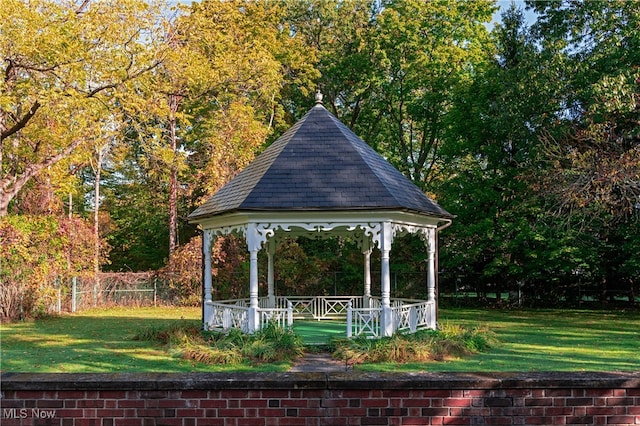 view of community with a lawn and a gazebo