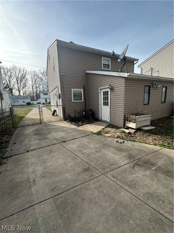 1233 Hulett Ave, Eastlake, OH 44095 - rear view of property featuring a patio area