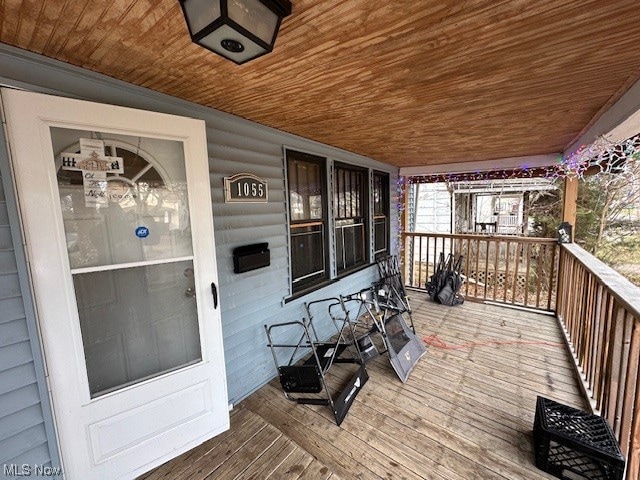 wooden deck featuring a porch