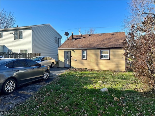 view of property exterior featuring a yard