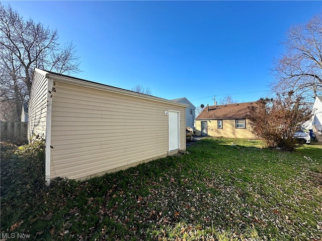 view of home's exterior featuring a yard