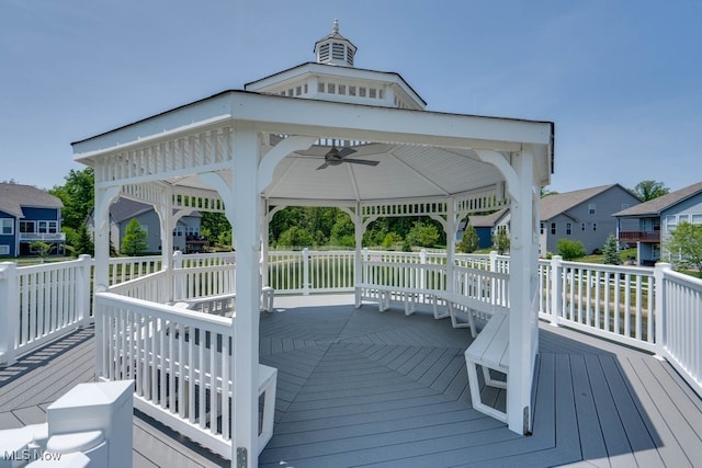 deck featuring a gazebo and ceiling fan