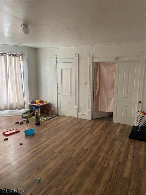 interior space with hardwood / wood-style flooring