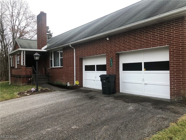 view of home's exterior with a garage