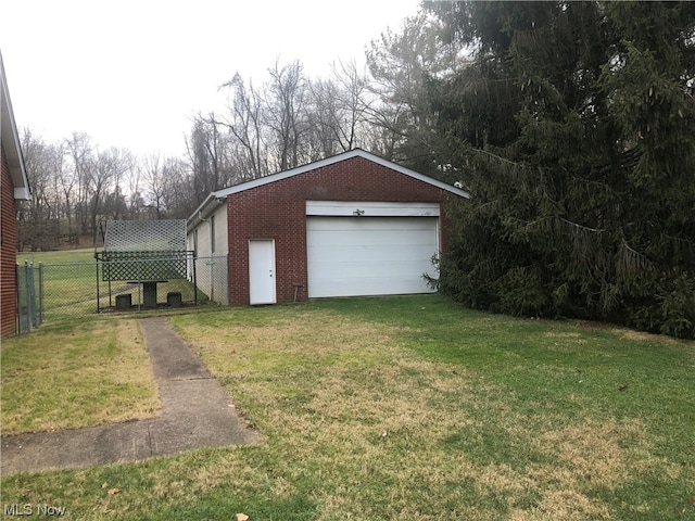 garage with a yard