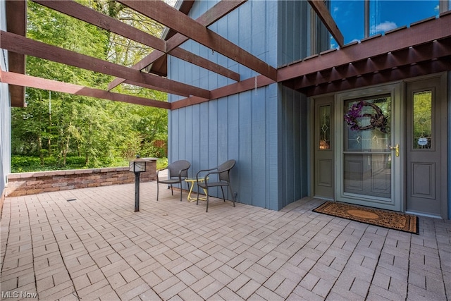 view of terrace featuring a pergola