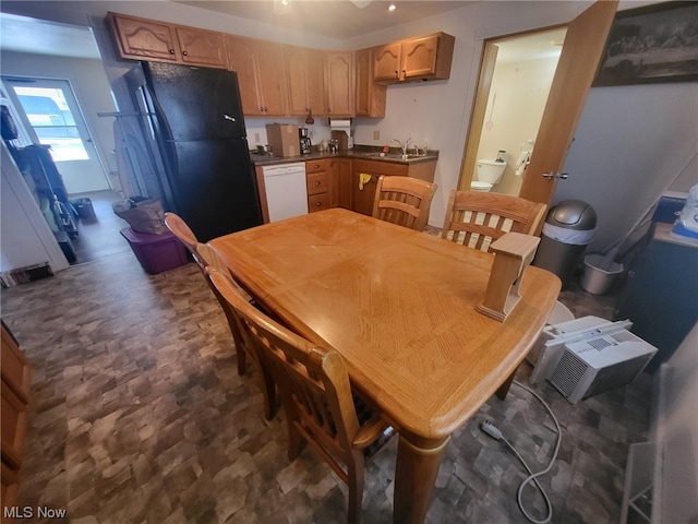 dining space featuring sink