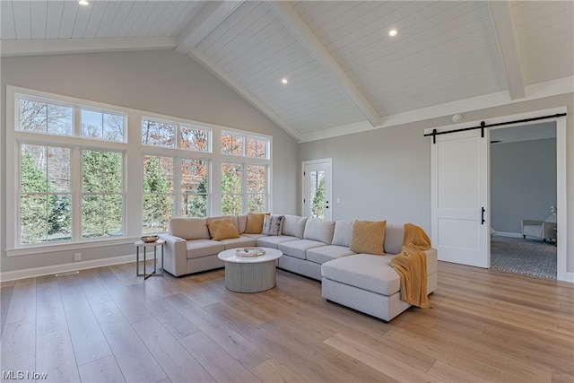 living room featuring a barn door, high vaulted ceiling, light wood-type flooring, and beamed ceiling