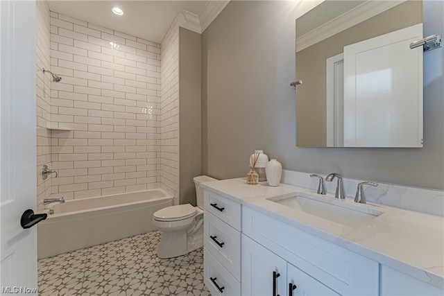 full bathroom featuring crown molding, tile floors, tiled shower / bath, toilet, and large vanity