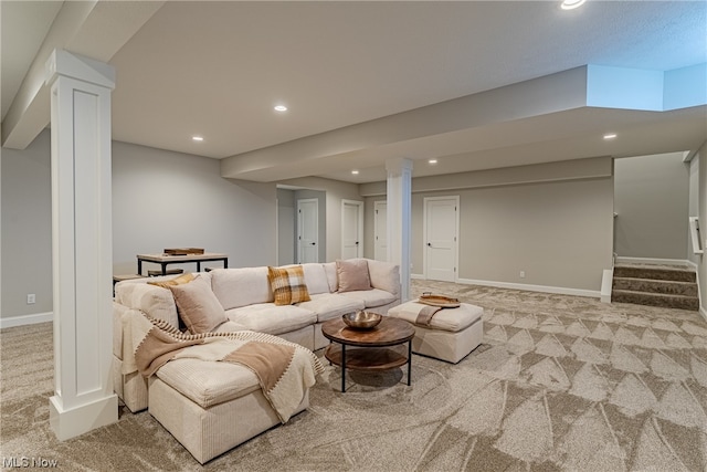 carpeted living room with ornate columns