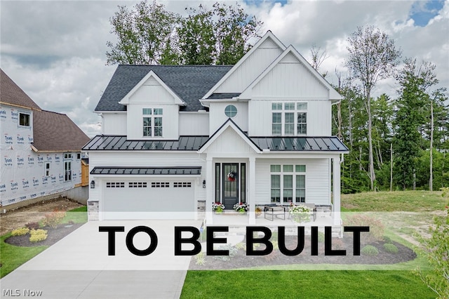 view of front facade with a front lawn and a garage