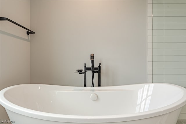 bathroom featuring a tub