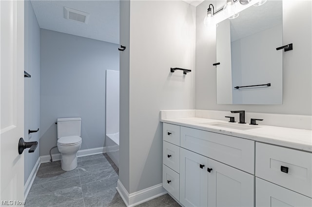 full bathroom featuring toilet, vanity, washtub / shower combination, and tile flooring