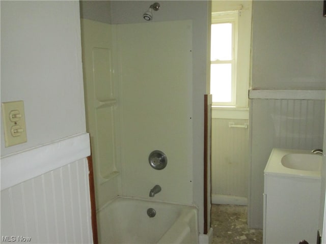 bathroom with shower / bathing tub combination and vanity