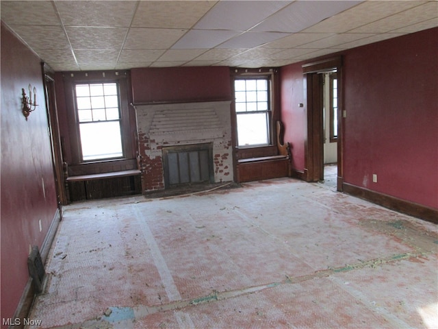 unfurnished living room with a fireplace