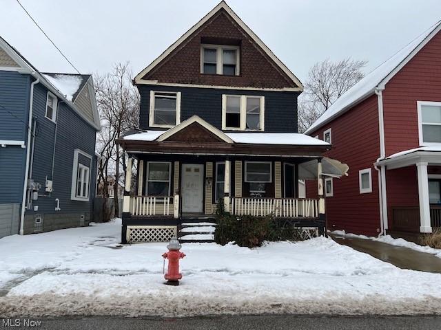 view of property featuring a porch